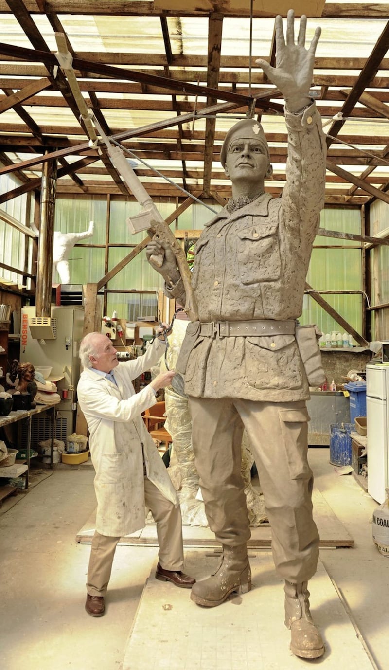 John Sherlock working on the UDR memorial which now stands in Lisburn city centre. Picture by John Harrison