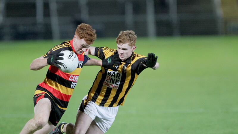 St Patrick&rsquo;s, Cullyhanna&rsquo;s Jason Duffy fends off Crossmaglen&rsquo;s Paudie Stuttard during last night&rsquo;s Armagh SFC semi-final at the Athletic Grounds.&nbsp;Picture by Colm O&rsquo;Reilly&nbsp;
