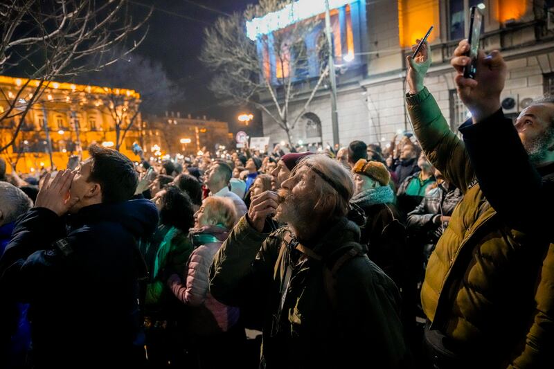 Thousands joined the protest (Darko Vojinovic/AP)