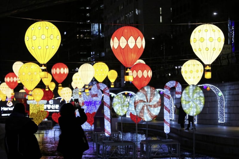 Reference to &#39;the holy season of Advent&#39; has almost imperceptibly been replaced by the expression &#39;the run-up to Christmas&#39;, to say nothing of the omnipresence of &#39;Christmas lights&#39; - such as these bright decorations displayed over the Cheonggye stream in Seoul, South Korea for the city&#39;s Christmas festival. Picture by AP Photo/Ahn Young-joon 