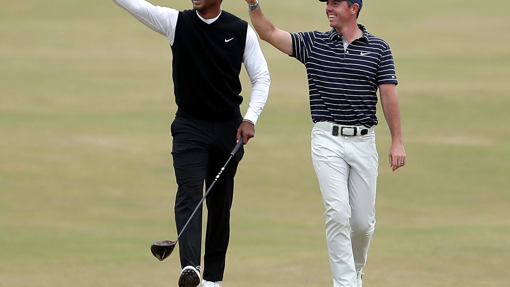 Rory McIlroy, right, has denied rumours of a fallout with Tiger Woods