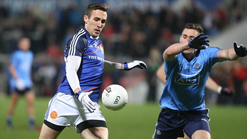 Former Down midfielder Dan Gordon, left, lines out for Loughinisland in the&nbsp;Ulster Club Intermediate Football Championship preliminary round against Greenlough