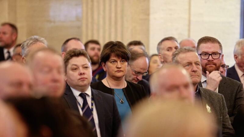 DUP leader Arlene Foster, centre, at the unveiling of a portrait at Stormont of former deputy first minister Martin McGuinness. Picture by Mal McCann 