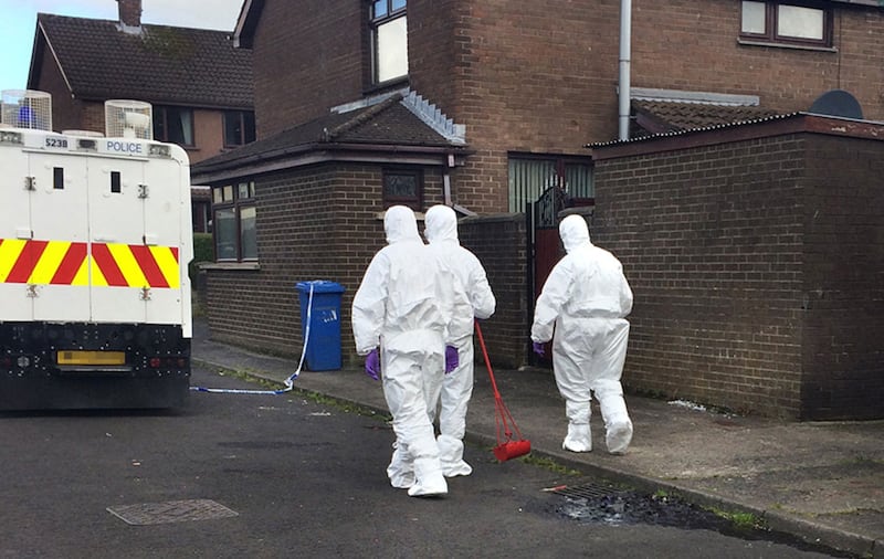 Police examine the scene where a man was shot four times in the Bogside area of Derry last night. Picture: Margaret McLaughlin&nbsp;