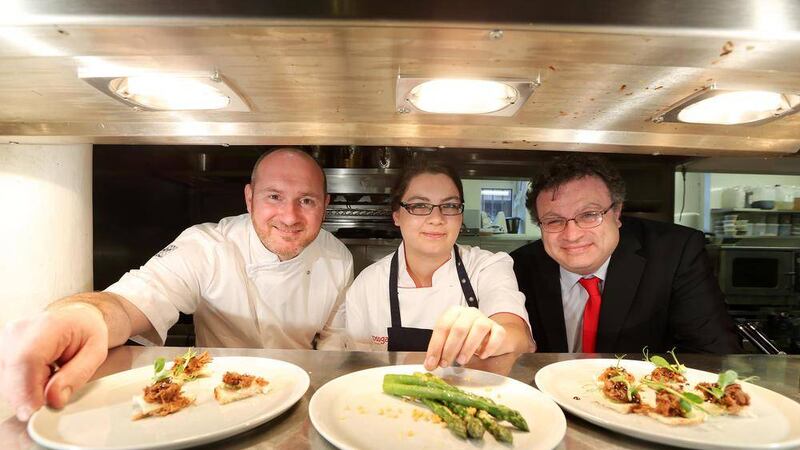 Apprentice Charlotte McGrath pictured with Employment Minister Stephen Farry and Niall McKenna of James Street South as they launch the second Apprentice scheme run by the award-winning restaurant 