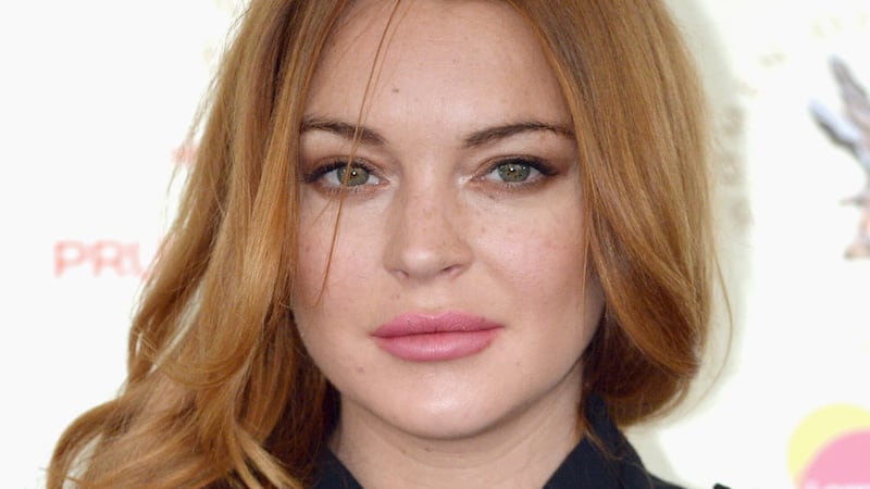 Lindsay Lohan has shared her first picture since giving birth (PA Archive/Anthony Devlin)