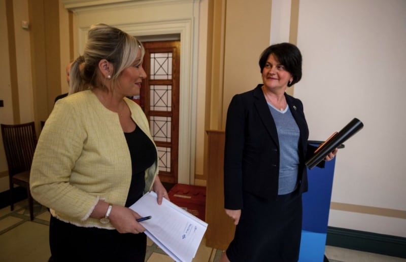 Behind the scenes at Stormont during the Covid-19 pandemic with First Minster Arlene Foster (right) and deputy First Minister Michelle O'Neill (left). Picture by Liam McBurney, Press Association