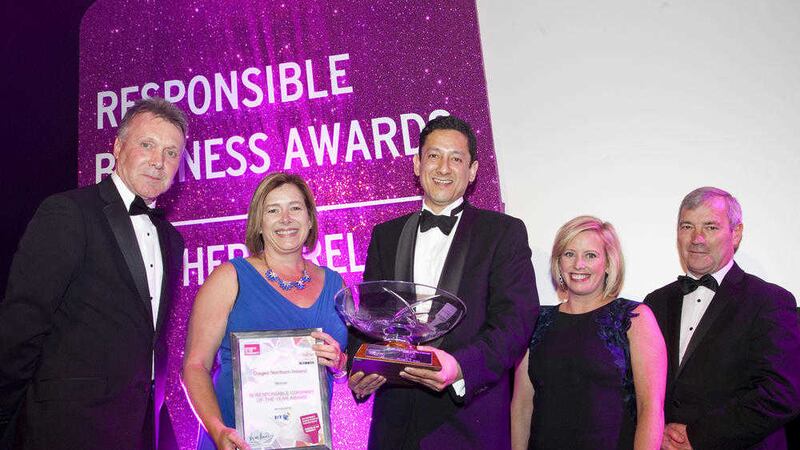 Accepting the diageo award are Lynn Graham, Jorge Lopez and Claire Hutchinson from Diageo with Kieran Harding of Business in the Community (left) and Alex Crossan representing sponsors BT (right) 