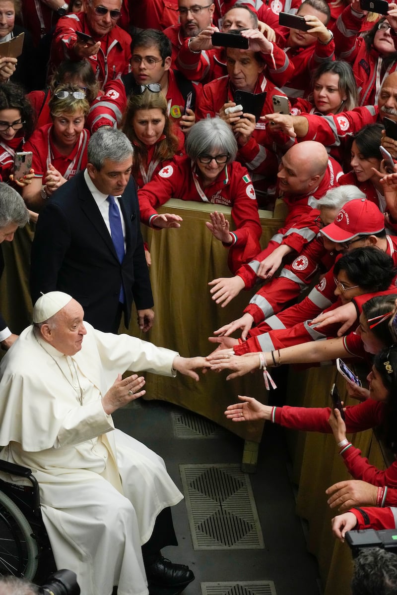 Pope Francis meets with volunteers of the Italian Red Cross in the Paul VI hall at the Vatican (Gregorio Borgia/AP)
