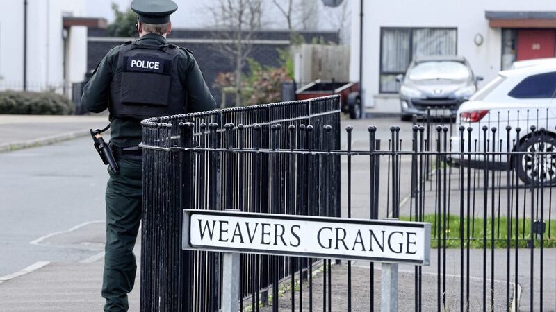 Police officers at the scene of a previous petrol bomb attack in Weavers Grange in Newtownards. Picture by Mal McCann.