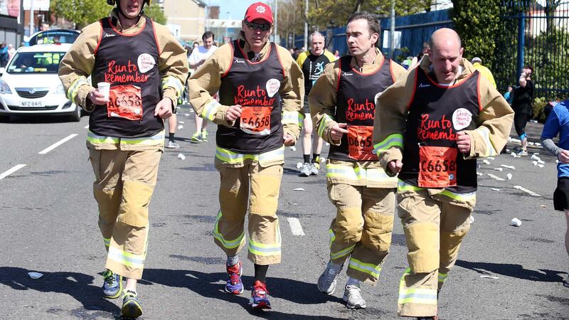 Firefighters running in aid of the Chest Heart and Stroke Association. Picture by Mal McCann
