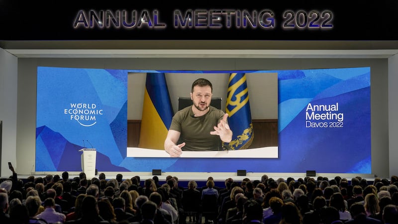 Ukrainian President Volodymyr Zelenskyy displayed on a screen as he addresses the audience from Kyiv on a screen during the World Economic Forum in Davos, Switzerland, Monday, May 23, 2022.<br />The annual meeting of the World Economic Forum is taking place in Davos from May 22 until May 26, 2022 (AP Photo/Markus Schreiber)&nbsp;