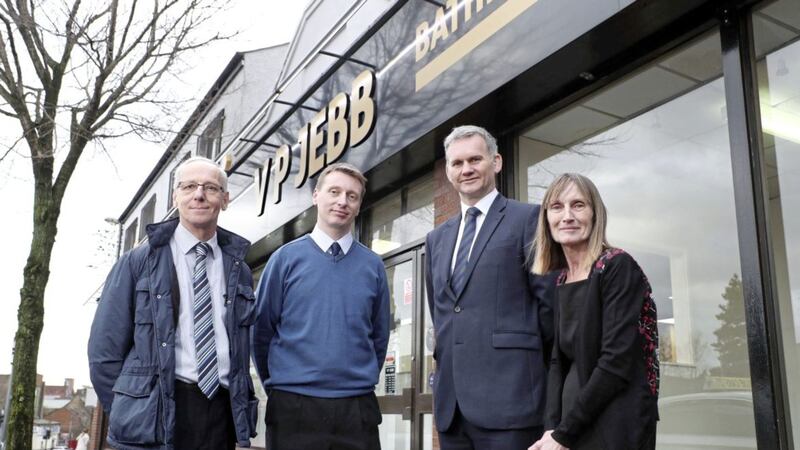 Alan Wright, managing director at Bassetts (second from right) joins store manager Alex Jebb and former owners of V P Jebb, Ernest and June Jebb, as Bassetts welcomes the newly acquired business to its branch network. 