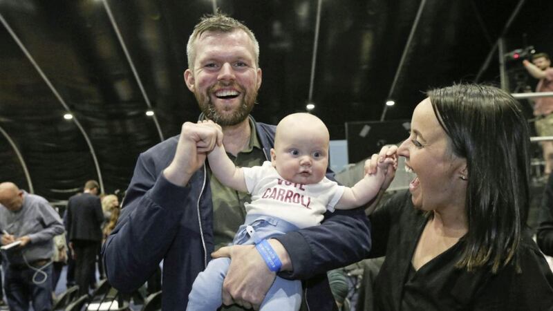 People Before Profit&#39;s Gerry Carroll celebrates his election with partner Mil&egrave;ne Fegan and baby son Feilim&iacute;. Picture by Hugh Russell. 