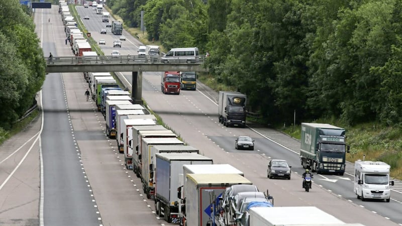 Lorries parked on the M20 in Ashford, Kent in England 