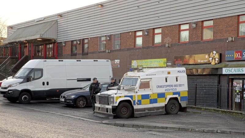 Police at the Cog&uacute;s office in Ardoyne Avenue on Monday morning. Picture by Cliff Donaldson 