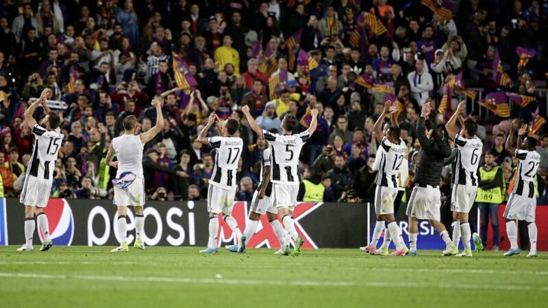 Juventus players celebrate at the end of the Champions League quarter-final, second leg at the Nou Camp 