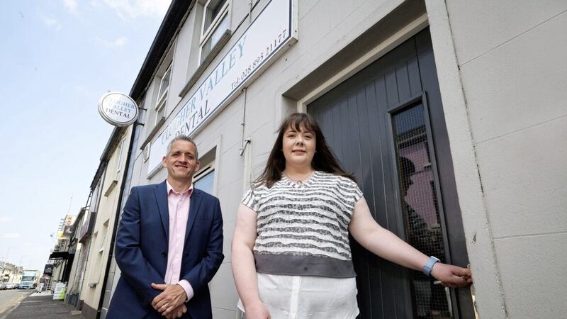Dental surgeon Carla Overend (right), the new owner of Clogher Valley Dental, which she has acquired with the backing of Ulster Bank. Also pictured is the bank's business development manager, Paul Reid. 