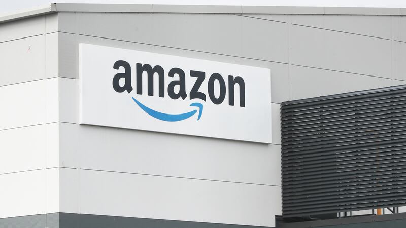 Amazon has posted an absolute emissions cut of 0.4% (Niall Carson/PA)