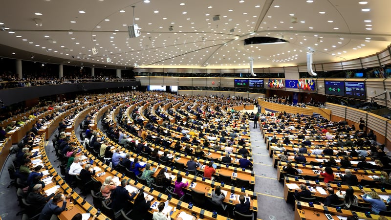 Members of the European Parliament participate in a series of votes as they attend a plenary session at the European Parliament in Brussels (Geert Vanden Wijngaert/AP)