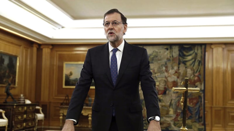 Mariano Rajoy takes the oath as prime minister at the Zarzuela Palace in Madrid. Picture by Chema Moya, Associated Press