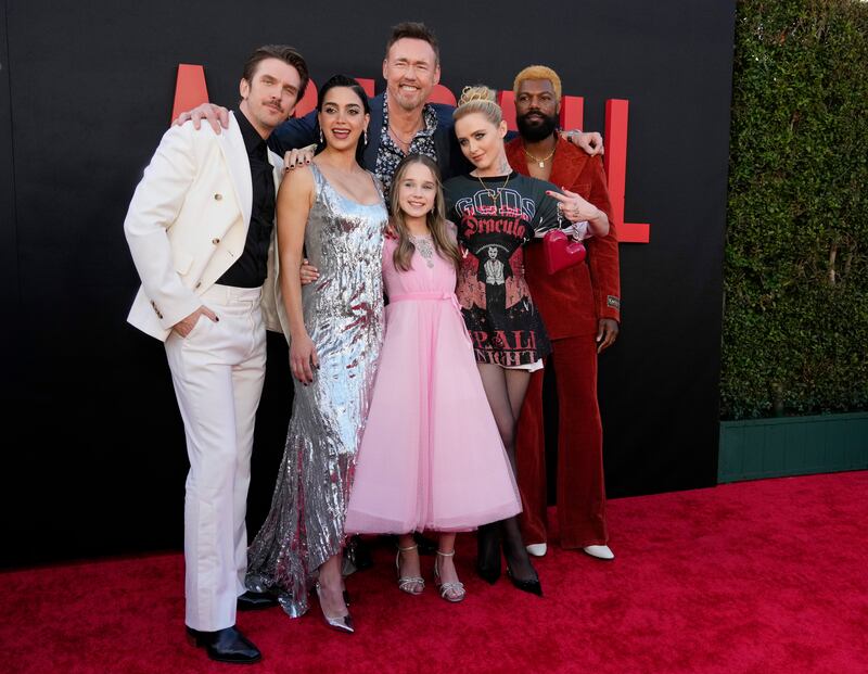 Cast members of “Abigail,” pose together at the premiere of the film at the Regency Village Theatre, Wednesday, April 17, 2024, in Los Angeles. (Chris Pizzello/AP)
