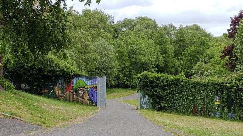 The peace wall gate dividing Alexandra Park in north Belfast was reopened on Saturday 