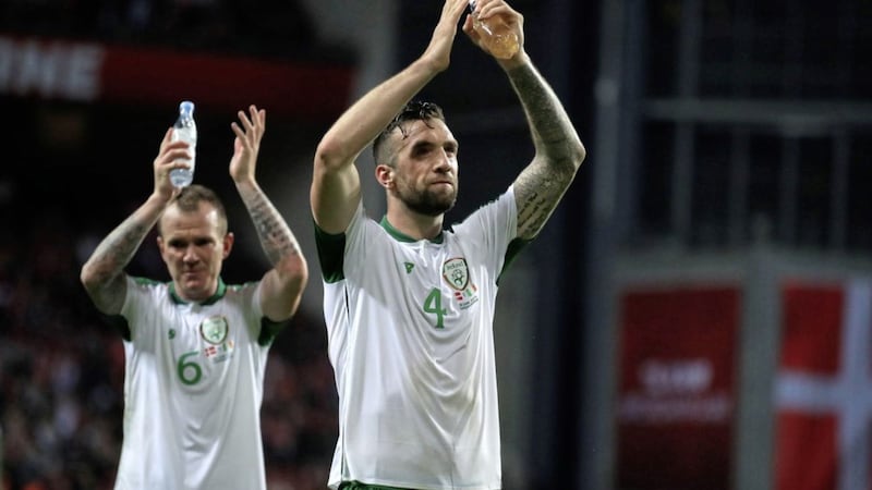 Republic of Ireland&#39;s Shane Duffy applauds the Irish fans after drawing with Denmark 