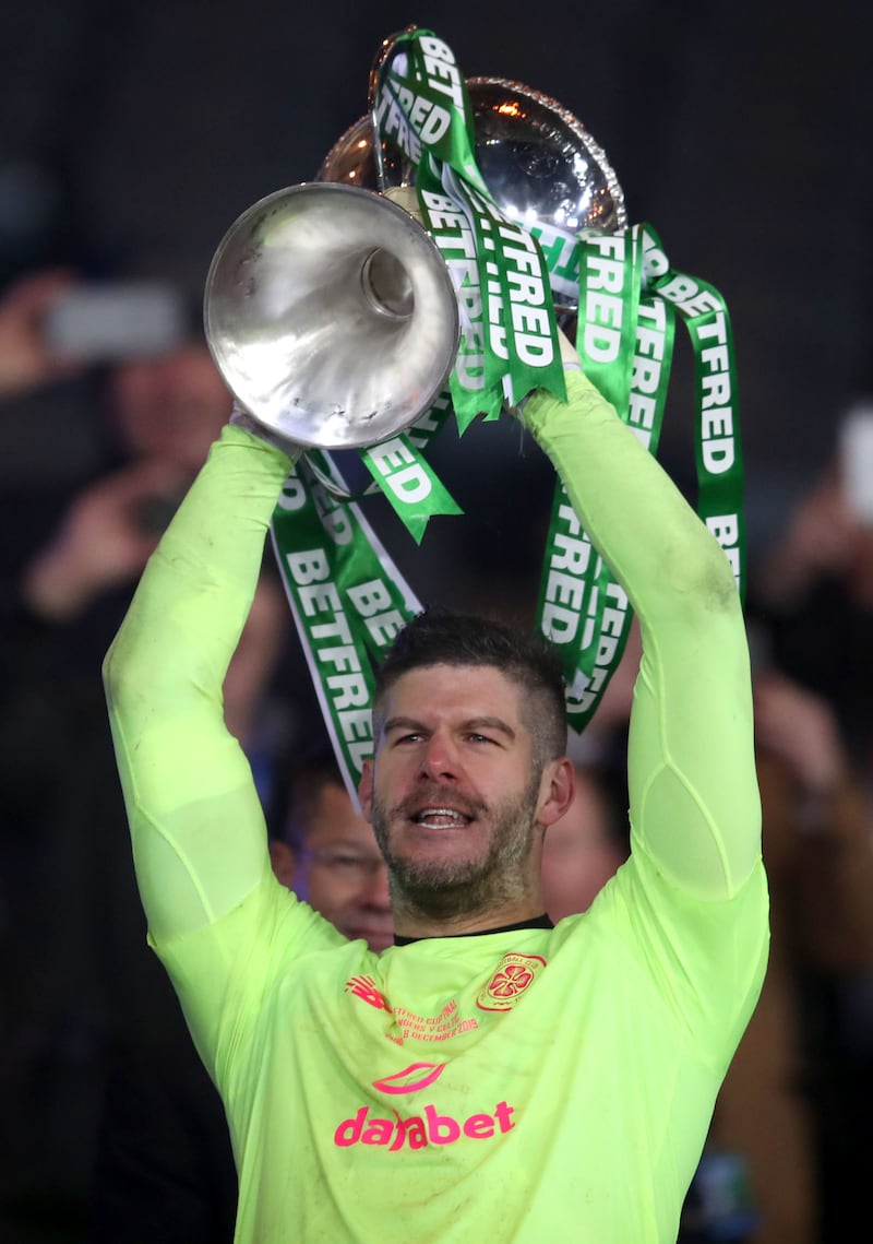 Celtic's Fraser Forster lifts the cup after winning the Scottish League Cup Final against Rangers at Hampden Park, Glasgow. on Sunday December 8, 2019. Picture by Jane Barlow/PA Wire. &nbsp;