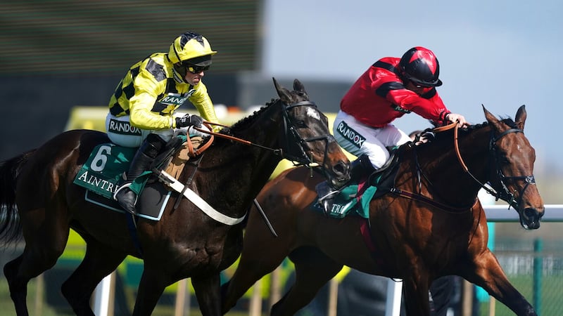 Nico de Boinville takes Shishkin (left) past Ahoy Senor and Brian Hughes to win the Alder Hey Aintree Bowl on the opening day of the Grand National meeting Picture by PA