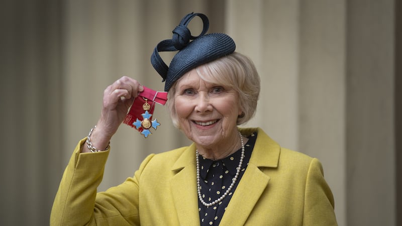 The Butterflies actress was honoured by the Queen at Buckingham Palace.