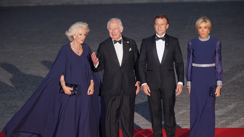 The King and Queen with the Macrons outside the banquet (Yui Mok/PA)