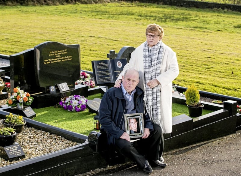 Stephen and Breege Quinn at the graveside of their murdered son Paul Quinn at St Patrick&#39;s Church Cullyhanna Co. Armagh. Liam McBurney/PA Wire 