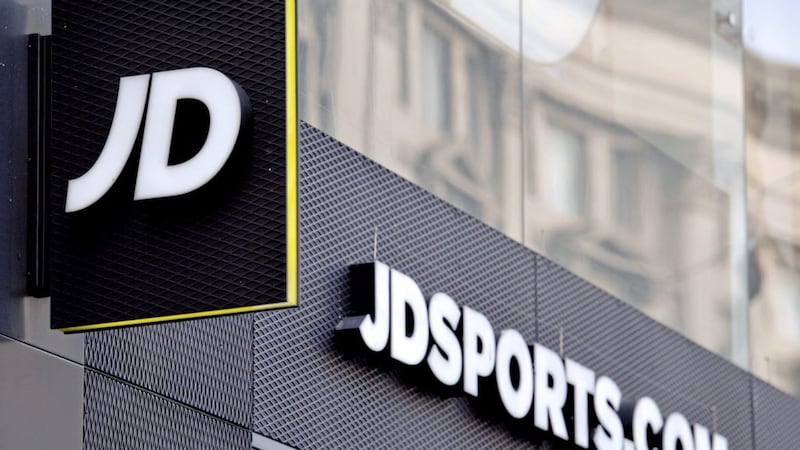 JD Sports has unveiled a record &pound;947.2 million annual profit but is warning that earnings will remain flat in the current financial year amid the cost-of-living crisis 