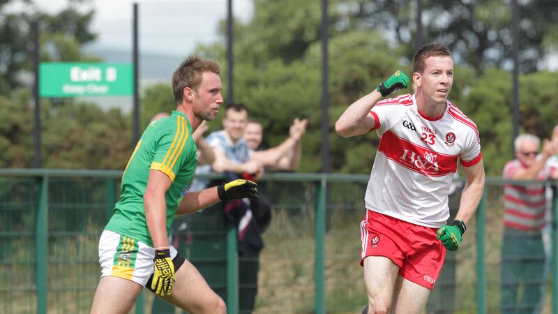 Derry's Niall Loughlin (right) celebrates his goal against Meath during the round two qualifier at Owenbeg on Saturday<br />Picture by Margaret McLaughlin&nbsp;