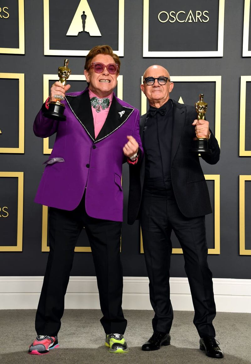 Bernie Taupin with Sir Elton John and their Best Original Song Oscar for I'm Gonna Love Me Again from Rocketman