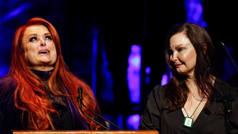 Wynonna and Ashley Judd accepted the induction amid tears after the death of their mother at the age of 76.