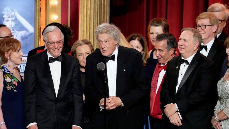 Sir Tom Stoppard, center, and members of the company of Leopoldstadt accept the award for best play at the 76th annual Tony Awards (Charles Sykes/Invision/AP)