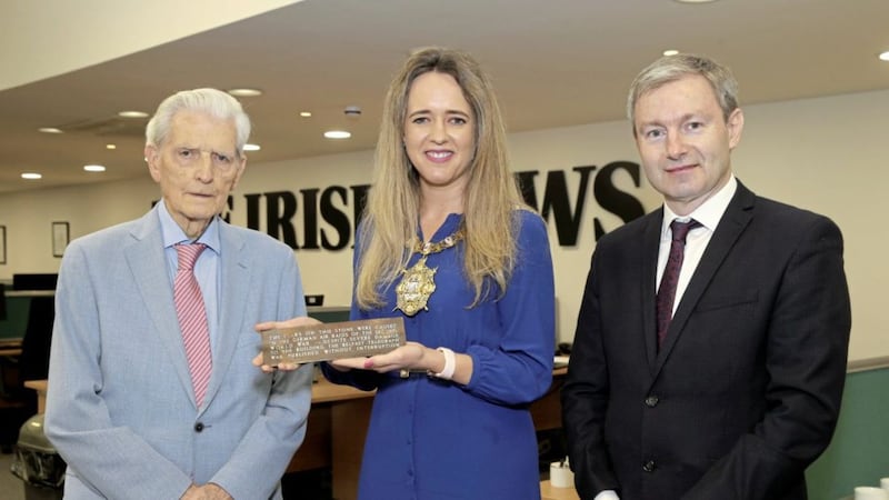 Belfast Lord Mayor Kate Nicholl visits The Irish News offices to pick up the Belfast Blitz plaque with Irish News chairman Jim Fitzpatrick and Belfast Telegraph editor-in-chief Eoin Brannigan. Picture by Hugh Russell