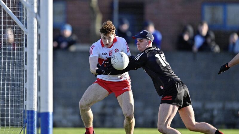 Lachlan Murray of Derry in action against Louth goalkeeper Peter McStravick in Ardee Picture by Sportsfile 