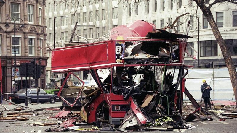 The remains of a double-decker bus in a London street after an IRA bomb exploded ripping the vehicle apart. Picture by Sean Dempsey/PA Wire. 