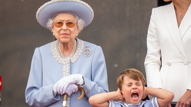 The late Queen and Prince Louis on the balcony of Buckingham Palace (Aaron Chown/PA)