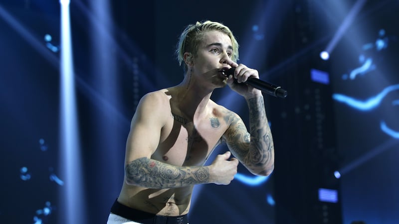 The Canadian pop star said Cruise would ‘never live it down’ if he refused the offer.