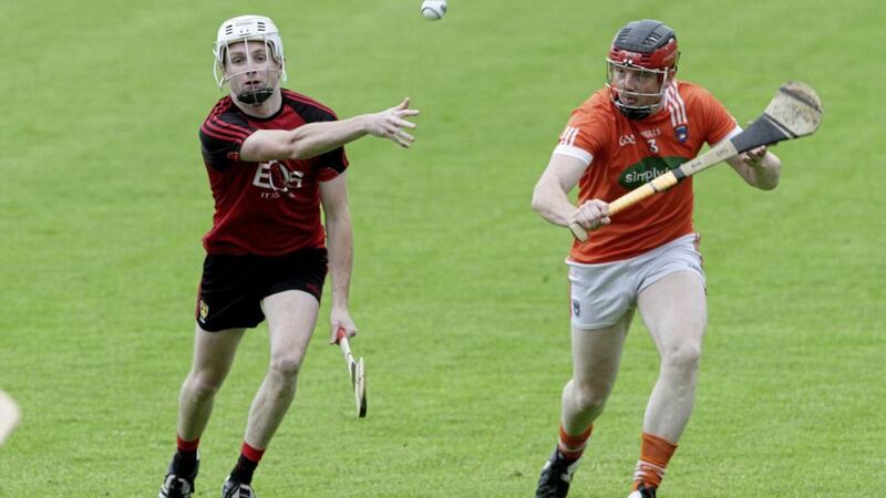 Armagh's Artie McGuinness moves in on Down's Conor Mageean in the Ulster Senior Hurling Championship semi-final at the Athletic Grounds, Armagh