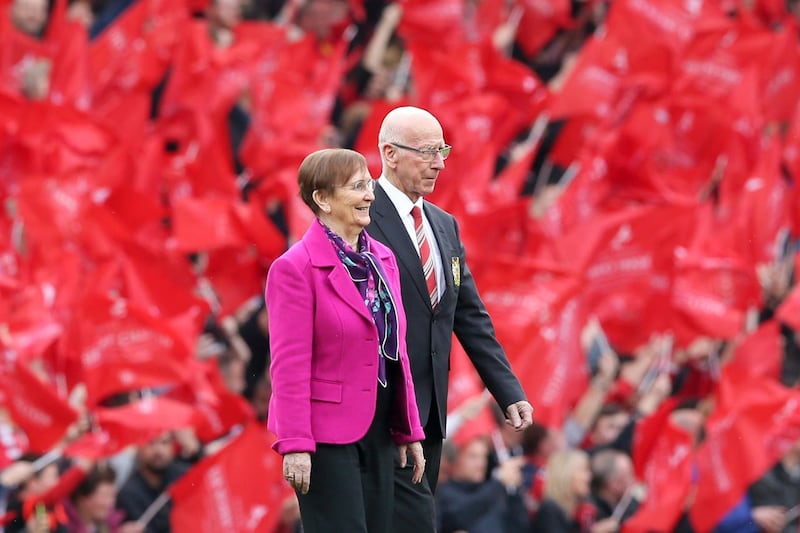 Sir Bobby Charlton, pictured on the Old Trafford pitch with his wife Norma as the South Stand was officially renamed the Sir Bobby Charlton Stand, remained a key figure at the club well after his retirement