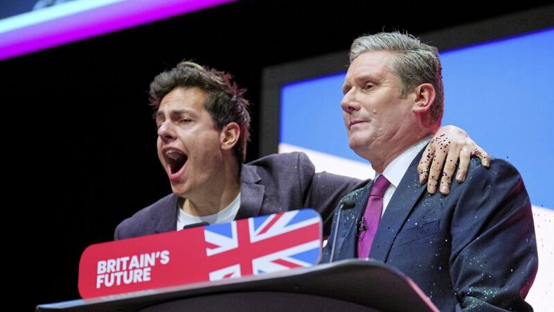 A man disrupts Labour Party leader Keir Starmer&#39;s speech to the Labour Party conference in Liverpool 