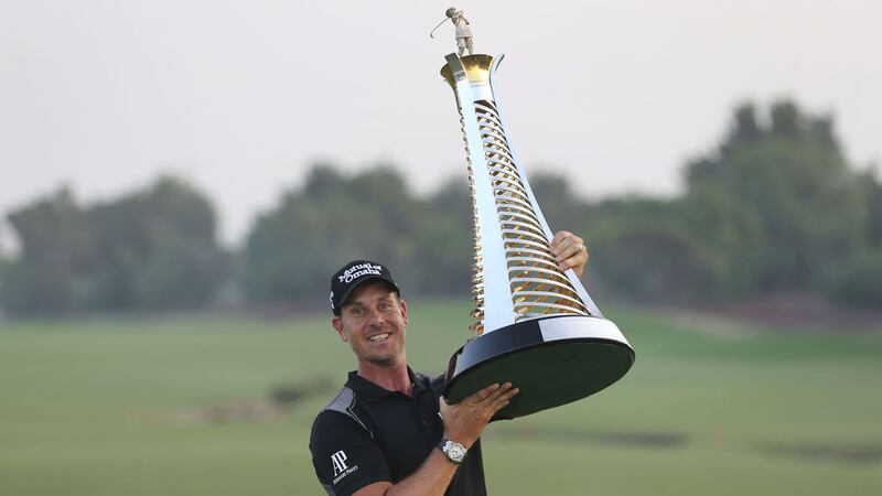 &nbsp;Henrik Stenson poses with the trophy after he won the Race to Dubai&nbsp;