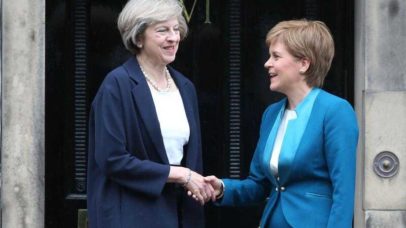 Shortly after her appointment, prime minister Theresa May was greeted by Scotland&#39;s first minister Nicola Sturgeon at Bute House in Edinburgh 