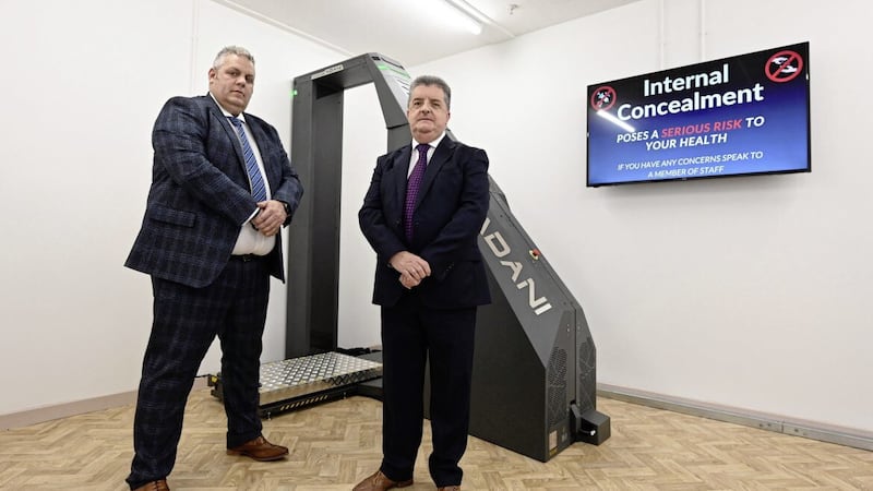 Governor of Maghaberry Prison, David Savage (left) and irector general of the Northern Ireland Prison Service, Ronnie Armour with one of the new X-ray scanners designed to find drugs being smuggled for prisoners.. Picture by Michael Cooper 