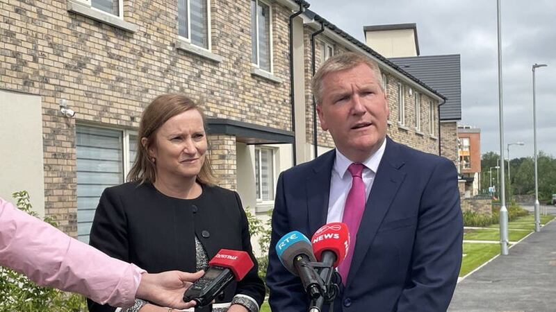 Minister for Finance Michael McGrath and Home Building Finance Ireland chief executive Dara Deering, in Ashtown, Dublin (PA)